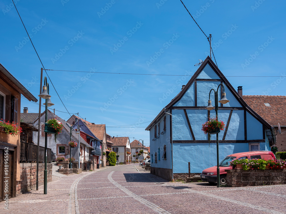 blue wall on half timbered house in ferench village in vosges area blue wall on half timbered house in ferench village in vosges area