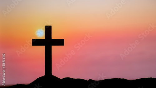 Silhouette Cross on the mountains