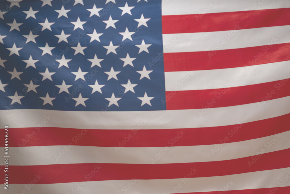 Fototapeta premium American flag as a background. Blurred background.