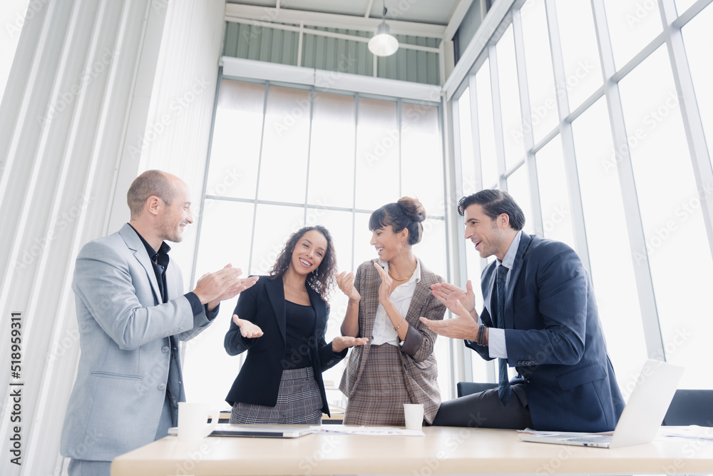 Diversity group of business people smiling happy celebrating success work in modern office Diversity group of business people smiling happy celebrating success work in modern office