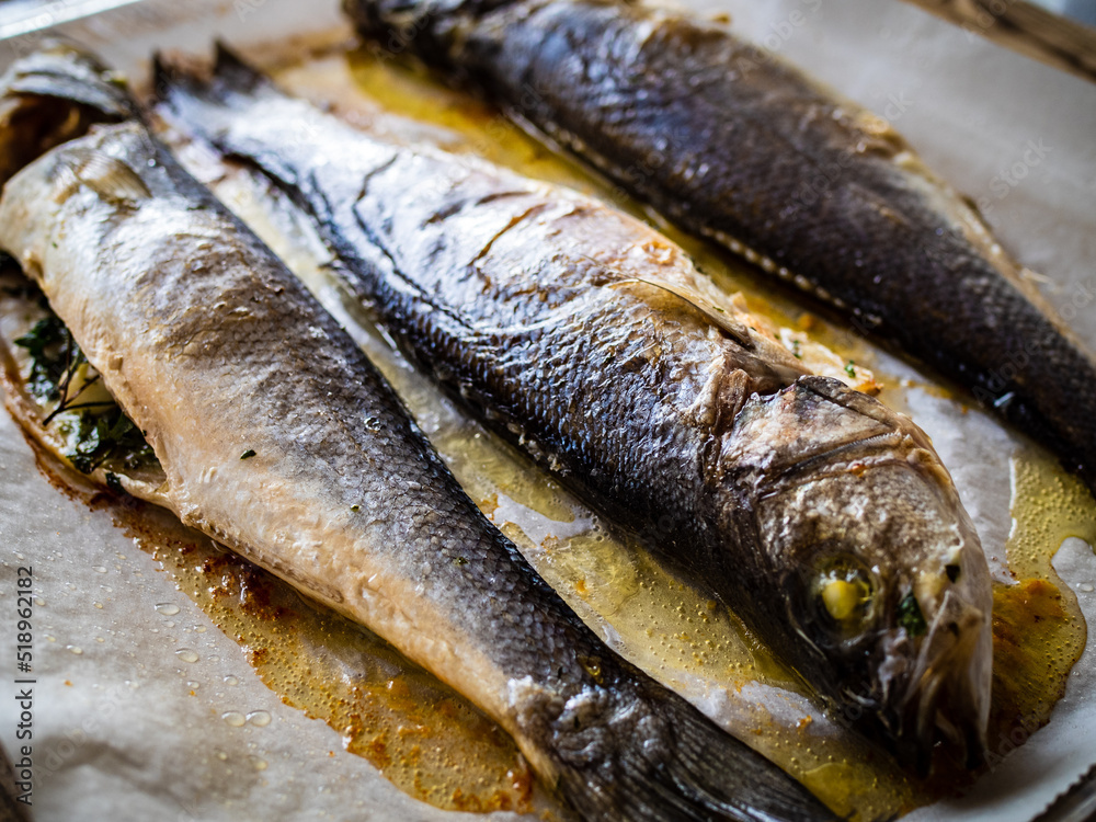 Roast perch on glass cooking pan
