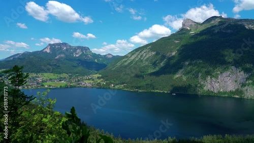 Stunning aerial panorama view of Altaussee lake  with the peaks Standling, Loser, Hochanger, Greimuth on a sunny summer day, Salzkammergut Ausseerland region, Styria, Austria
