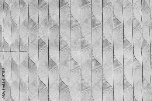 Photos surface of textured tile  wall with embossed pattern as black and white colorles