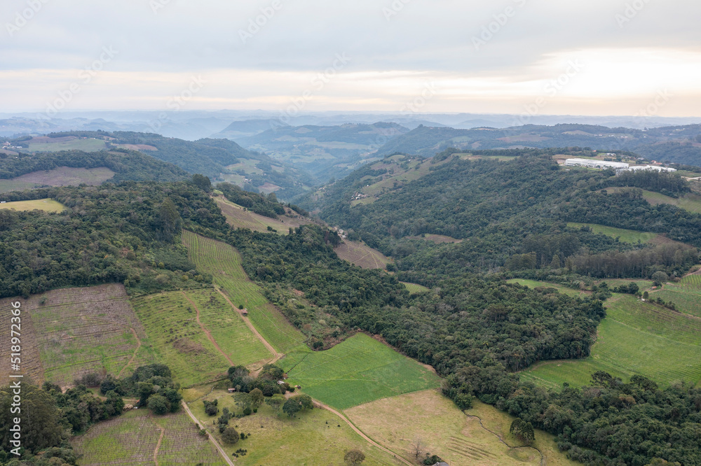 Small wine-producing farms in the region known as Vale dos Vinhedos in Bento Gonçalves, RS, Brazil, seen from a drone