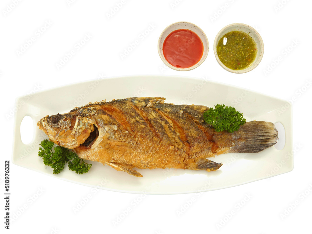 Fried fish with seafood sauce Isolated on white background. Fried fish with seafood sauce Isolated on white background.