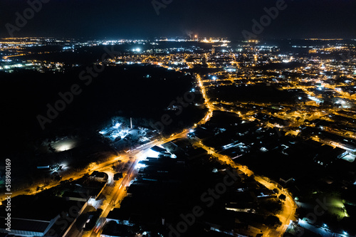 Fototapeta Naklejka Na Ścianę i Meble -  Foto aérea noturna da cidade de Paulínia. Localizada no interior de São Paulo. Brasil 2022.