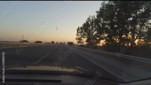 Driving car at sunset through a highway in Turkey. Car dashboard POV view. Travel concept. View from inside a car.