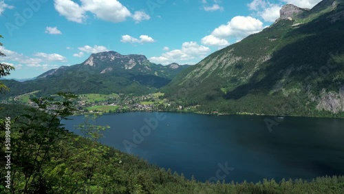 Stunning aerial panorama view of Altaussee lake  with the peaks Standling, Loser on a sunny summer day with moving cloud, Salzkammergut Ausseerland region, Styria, Austria