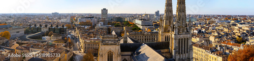Stunning panoramic aerial cityscape from Pey Berland tower of St. Andrew's Cathedral beautiful sunny evening of warm golden autumn, Bordeaux, Gironde, Nouvelle-Aquitaine, France. photo