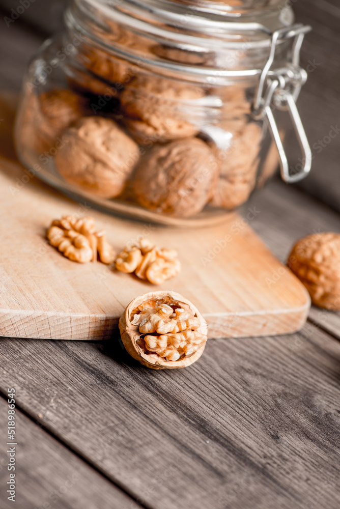 Healthy bio walnuts  on wood desk with detail background,  walnut on wood kitchen underlay.