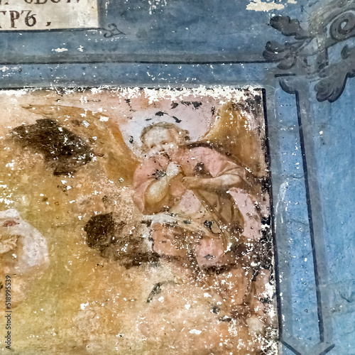 drawings on the walls of an abandoned temple