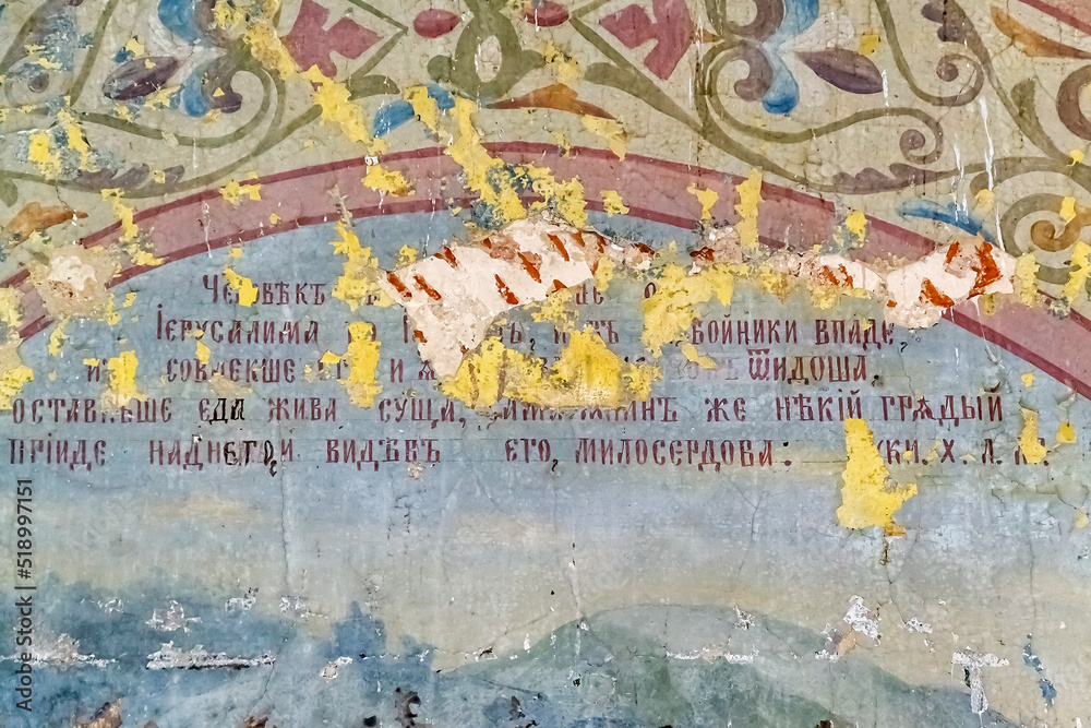 Naklejka premium pictures on the wall of an abandoned temple