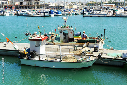 Barcos de pesca en el puerto pesquero de Rota, costa de Cádiz, Andalucía España photo