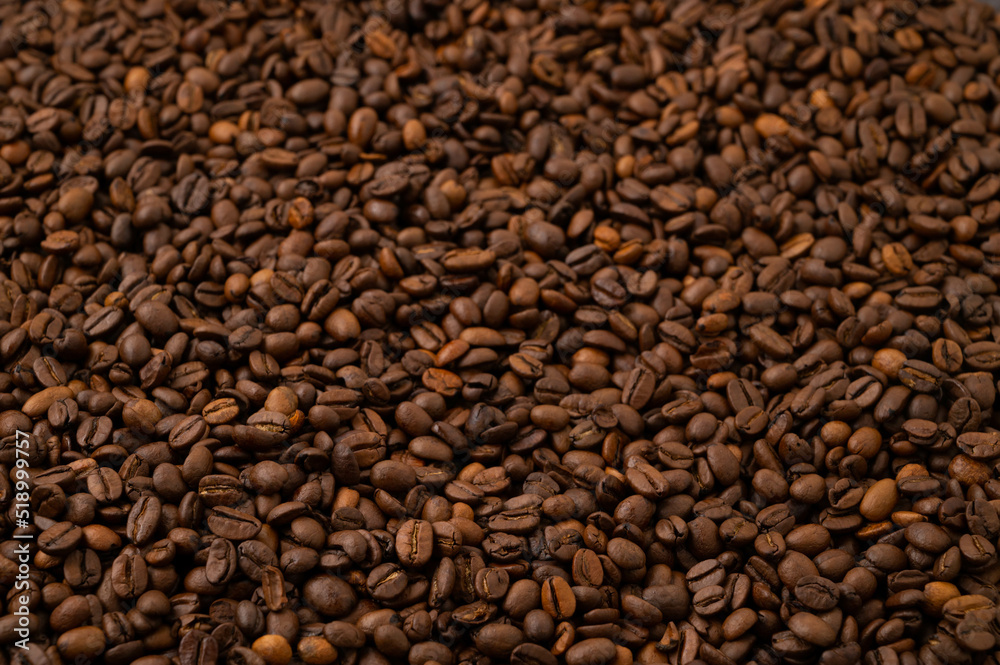 Roasted brown coffee beans background. Roasted brown coffee beans background.