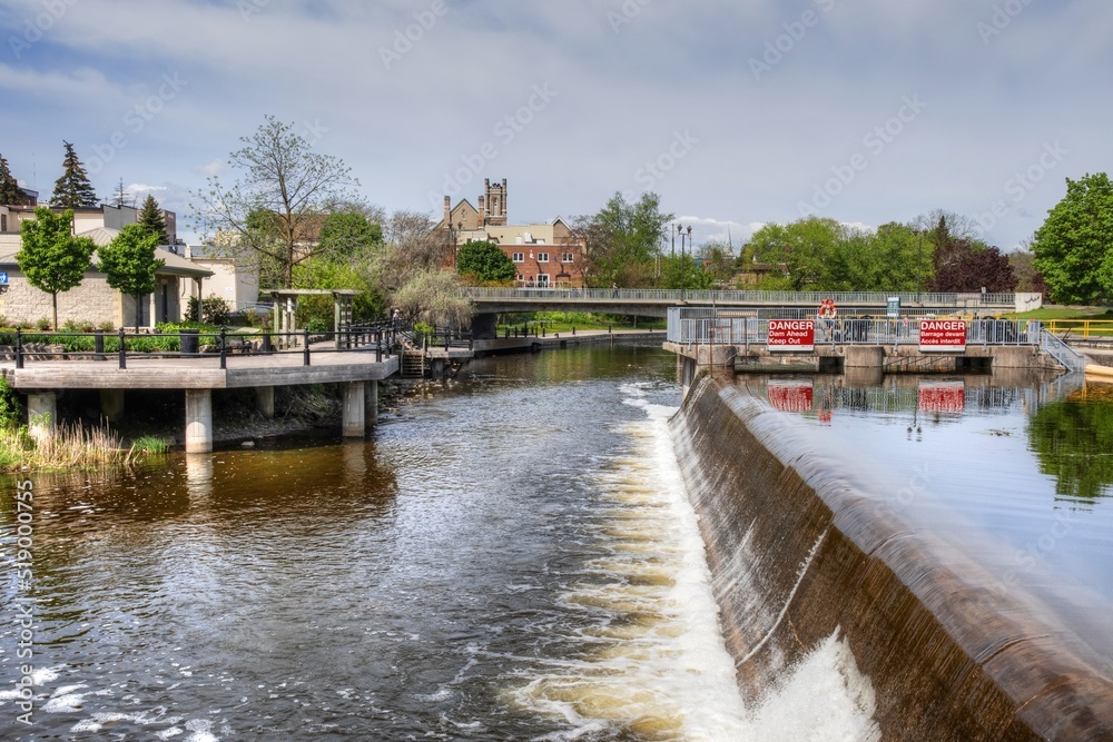 canal and river flowing under a bridge in Lindsay Ontario