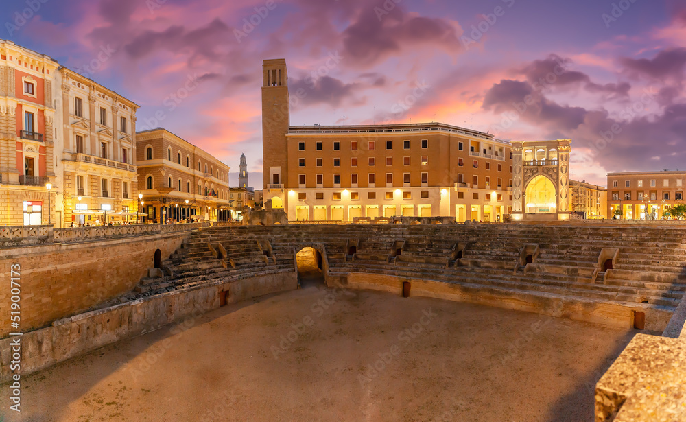 Ancient Roman Amphitheatre in Lecce t twilight time, Puglia region, southern Italy