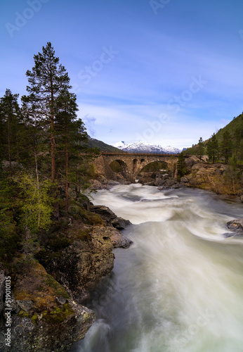 The Stuguflåt Bridge (Norwegian: Stuguflåtbrua or Stuguflåten bru), a stone railway bridge on the Rauma Line over the Rauma River in Innlandet county, Norway.
