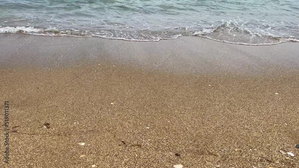 Peaceful view of the mediterranean sea with low waves on seashore Peaceful view of the mediterranean sea with low waves on seashore