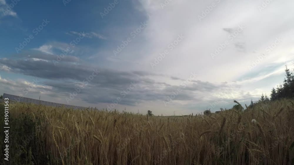 Time lapse movie of a storm cloud moving over the countryside of Transylvania, Romania on a sunny summer day. Time lapse movie of a storm cloud moving over the countryside of Transylvania, Romania on a sunny summer day.