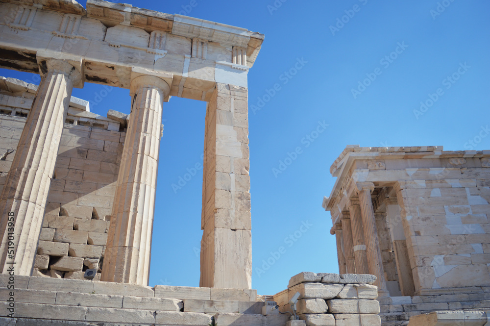 Photo of parthenon ruins in Athens, acropolis in Greece - Former ancient greek temple for Athena olympus goddess - Decorative sculptures, columns from ancient greece art, architecture and civilization
