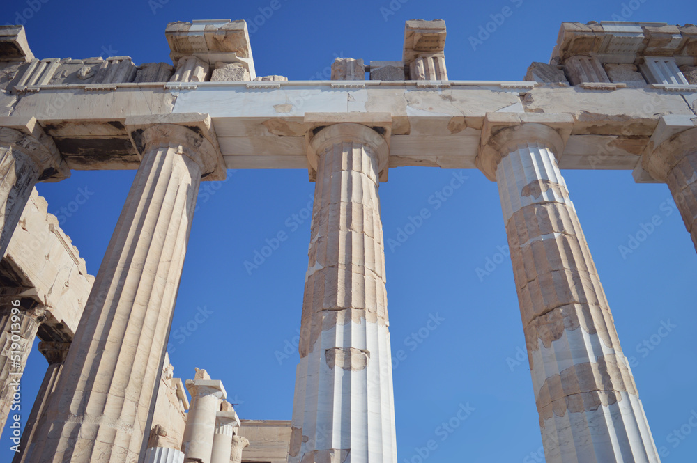 Photo of parthenon ruins in Athens, acropolis in Greece - Former ancient greek temple for Athena olympus goddess - Decorative sculptures, columns from ancient greece art, architecture and civilization