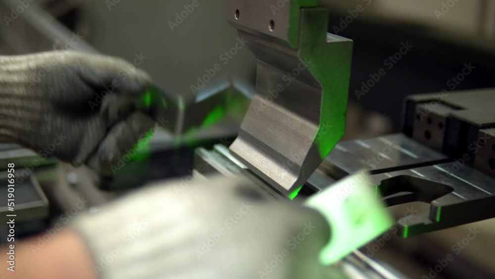 The Employee Hands Are Not Bending The Large Parts Of The Metal On The Bending Machine Closeup