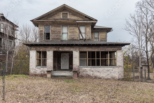 Two story house left abandoned in Birmingham neighborhood