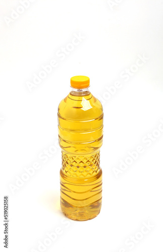A bottle of cooking oil isolated on white background with copyspace