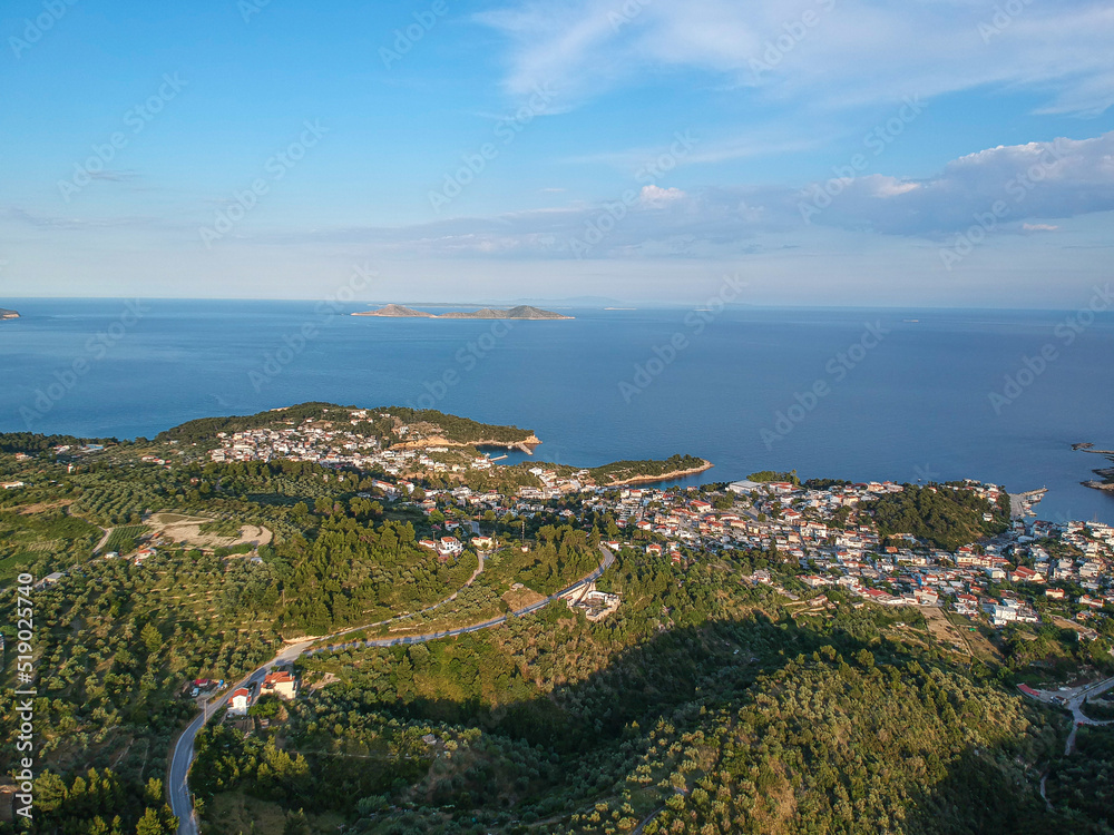 Aerial panoramic view over Alonissos island, Greece at sunset