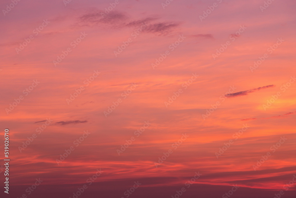 Beautiful sunrise, sunset red orange yellow sky with clouds abstract background texture