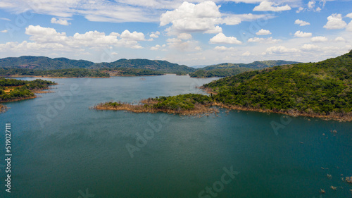 Lake among the mountains covered with jungle. Kalu Ganga Reservoir, Sri Lanka.