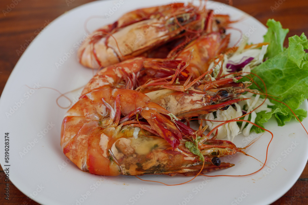 Heap of boiled prawn serve on white plate dish. Heap of boiled prawn serve on white plate dish.