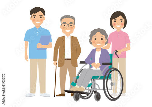 介護士と車椅子に乗ったおばあちゃんと杖をついたおじいちゃん