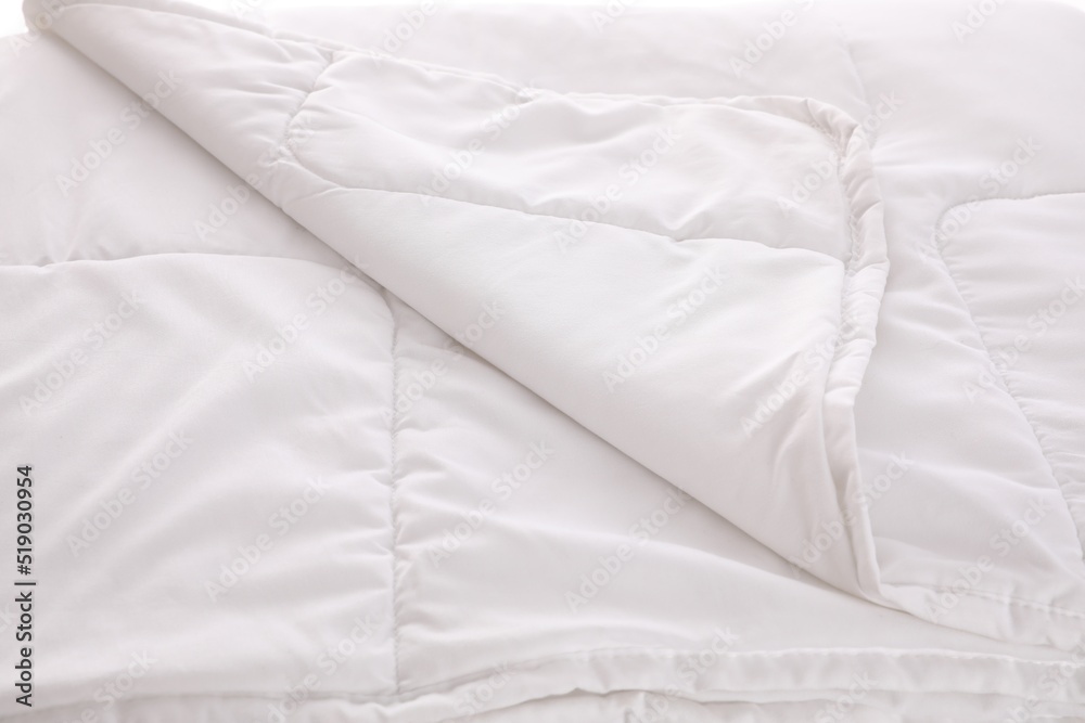 Clean soft white blanket as background, closeup