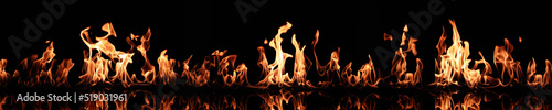 Bright fire flames on black background. Banner design