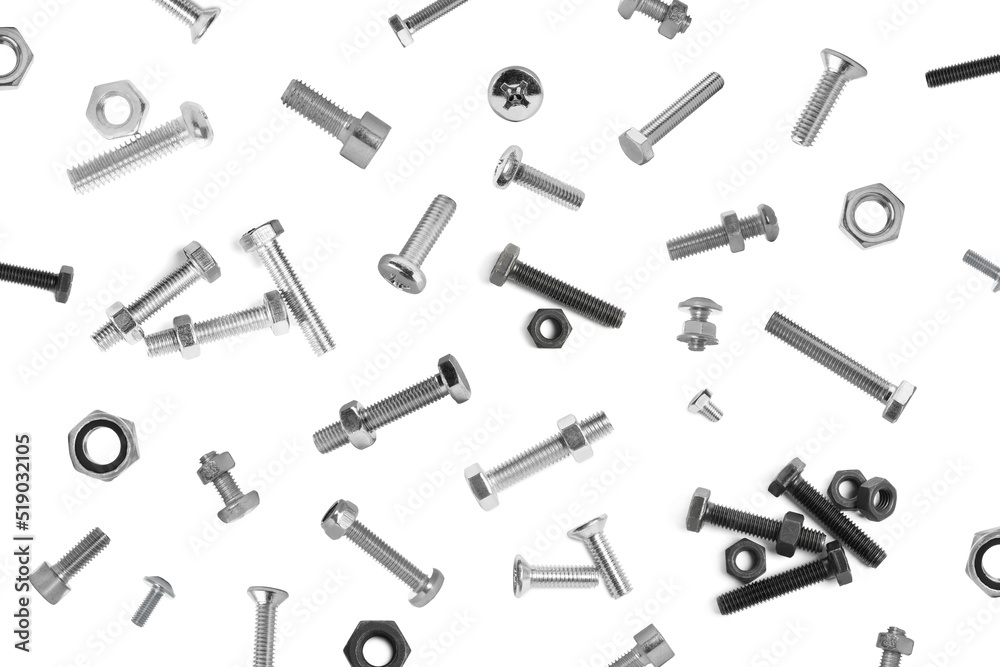 Many different bolts and nuts falling on white background Many different bolts and nuts falling on white background