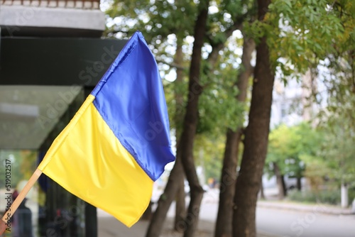 National flag of Ukraine on city street