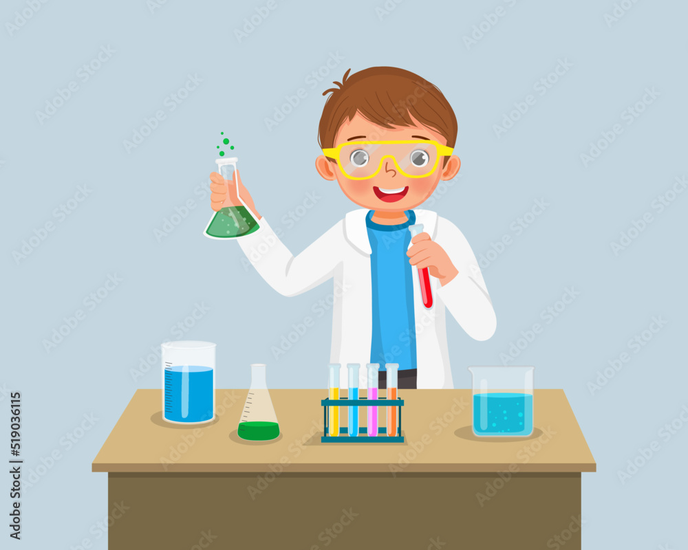 cute little boy scientist with safety goggles holding chemical liquid in flasks doing science project chemistry experiment in the laboratory cute little boy scientist with safety goggles holding chemical liquid in flasks doing science project chemistry experiment in the laboratory