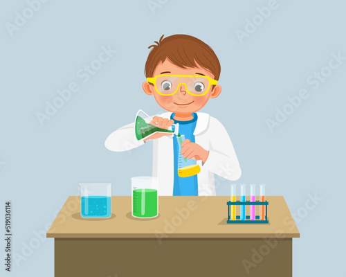 cute little boy scientist with safety goggles mixing chemical liquid in flasks doing science project  chemistry experiment in the laboratory