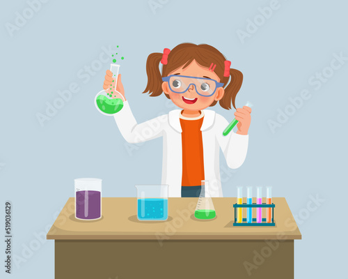cute little girl scientist with safety goggles holding chemical liquid in flasks doing science project  chemistry experiment in the laboratory