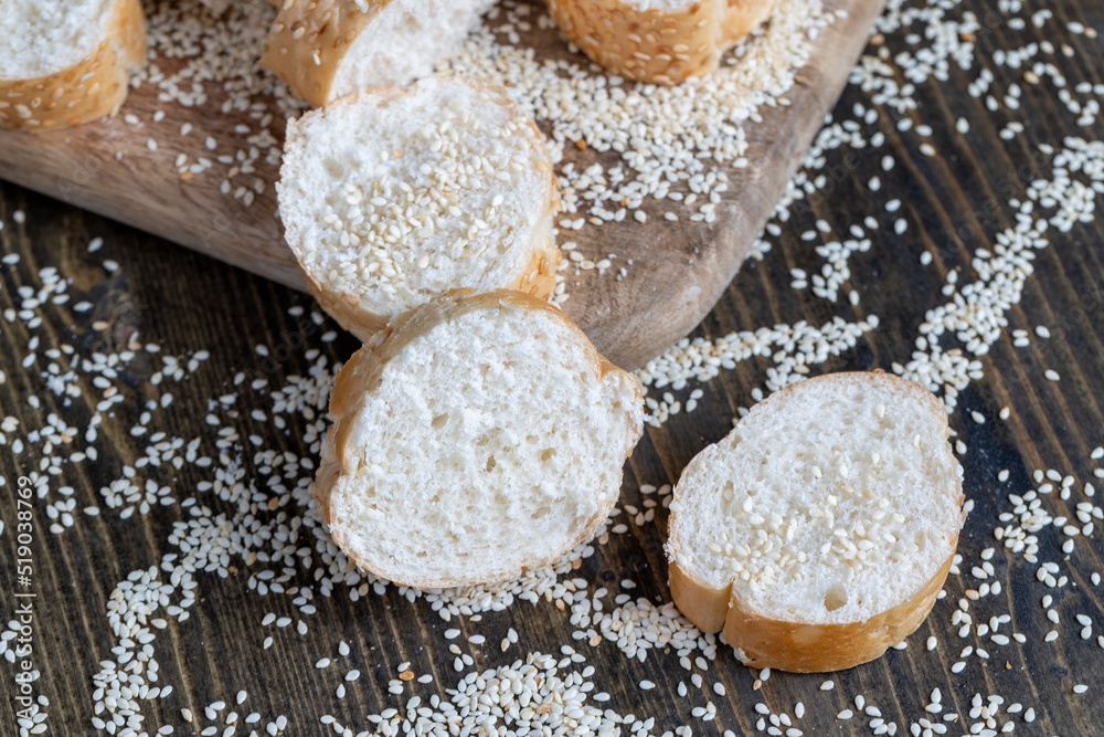 wheat grain baguette sprinkled with sesame seeds wheat grain baguette sprinkled with sesame seeds