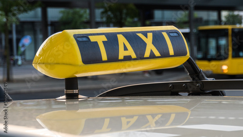 Taxi is waiting for the clients in the city center