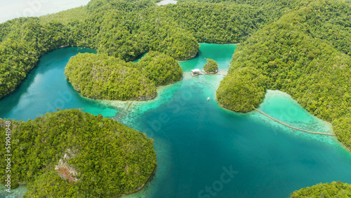 Turquoise waters of the Sugba Lagoon and islands covered with green forest and jungle. Siargao  Philippines. Summer and travel vacation concept.