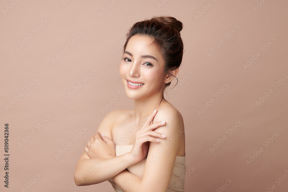 Beautiful young asian woman with clean fresh skin on beige background, Face care, Facial treatment, Cosmetology, beauty and spa, Asian women portrait. Beautiful young asian woman with clean fresh skin on beige background, Face care, Facial treatment, Cosmetology, beauty and spa, Asian women portrait.
