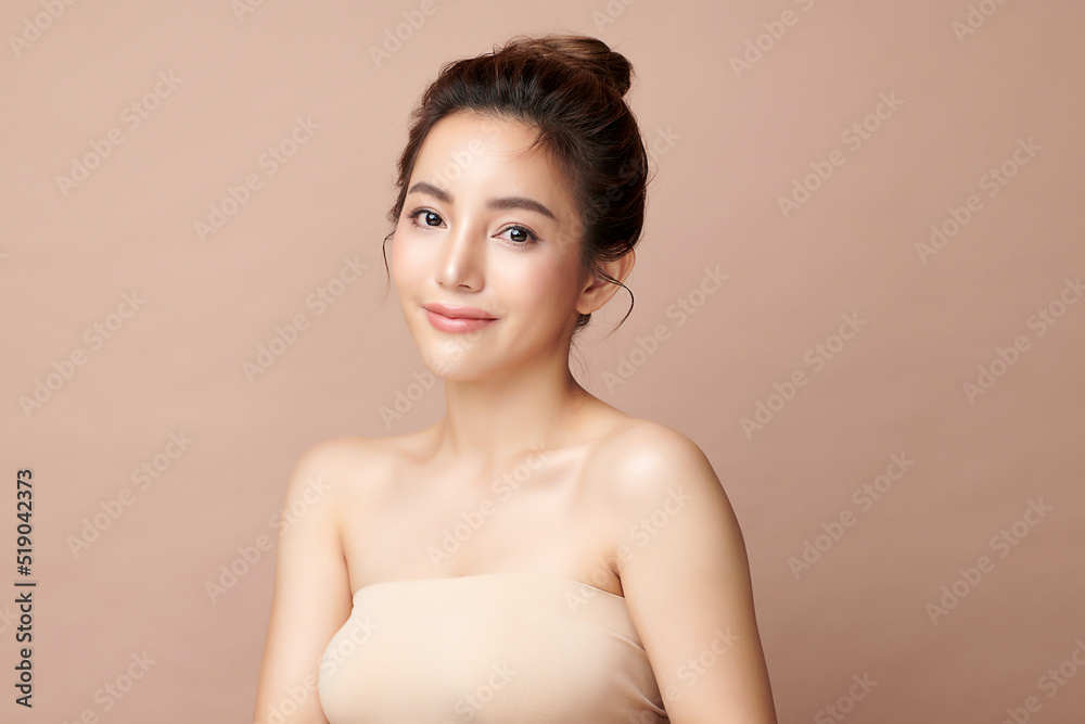 Beautiful young asian woman with clean fresh skin on beige background, Face care, Facial treatment, Cosmetology, beauty and spa, Asian women portrait. Beautiful young asian woman with clean fresh skin on beige background, Face care, Facial treatment, Cosmetology, beauty and spa, Asian women portrait.