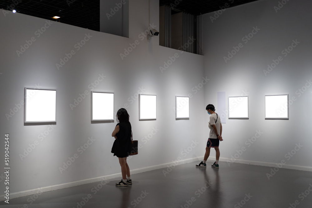 interior of gallery with blank frame interior of gallery with blank frame