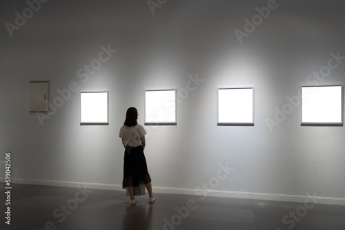 interior of gallery with blank frame © THINK b