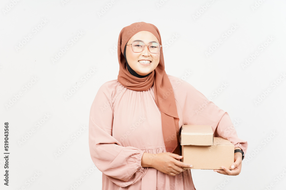 Holding Package Box or Cardboard Box of Beautiful Asian Woman Wearing Hijab Isolated On White Holding Package Box or Cardboard Box of Beautiful Asian Woman Wearing Hijab Isolated On White