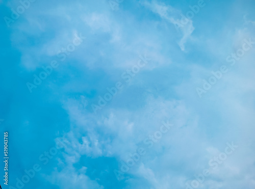 White clouds background on a bright blue sky in the morning. Sky nature wallpapers. Morning sky background