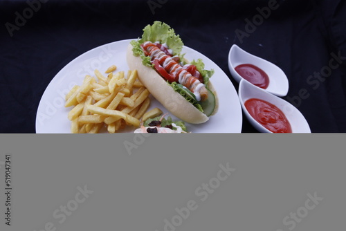 AMERICAN HOTDOG WITH FRENCH FRICE POTATO photo